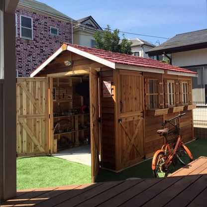 bike shed with double doors windows and window boxes